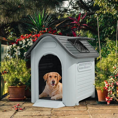 Casa grande para perros de 39,4"" al aire libre casa para perros de plástico casa para mascotas con tragaluz elevado Foto 1 de 4