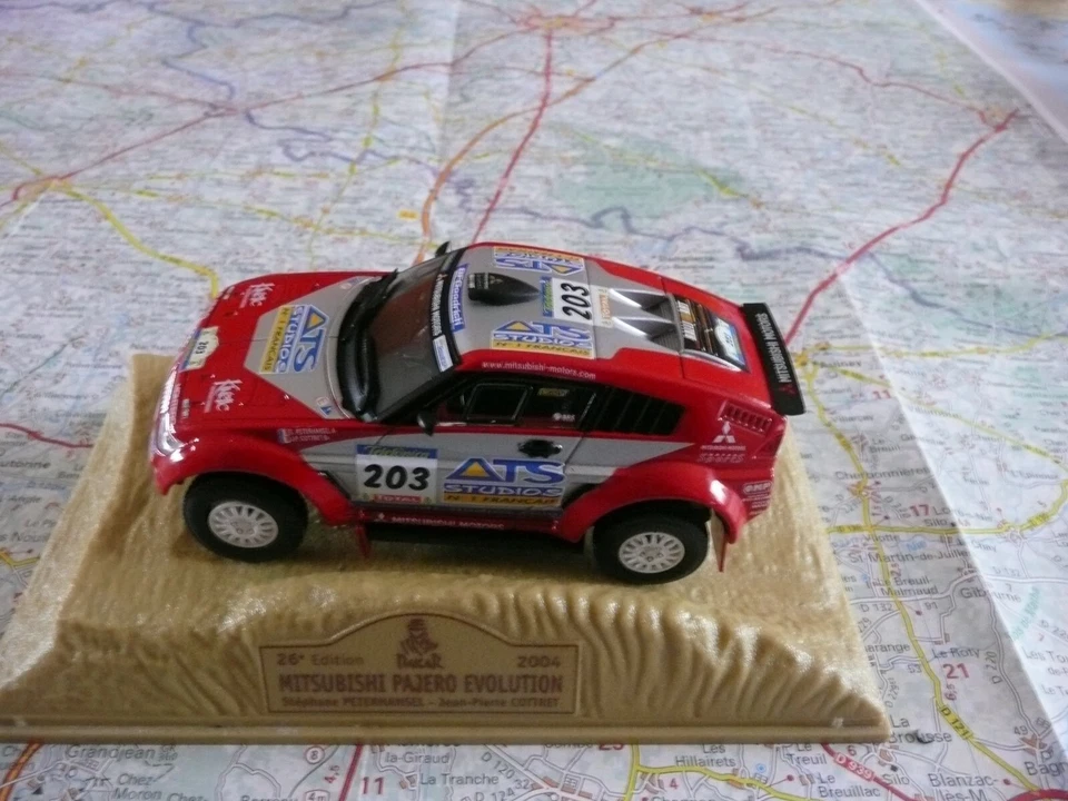 MITSUBISHI Pajero Evolution n°203 Paris Dakar 2004 NOREV 1/43 sur socle - Photo 1/1