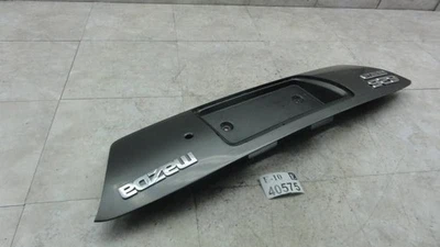 2001 Mazda 626 Rear Trunk Deck Lid License Plate Finish Panel Trim Cover OEM - Image 1 of 4