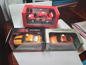 ✅SLOT CAR 1/32 AUTOART - LOTTO AUTO  MITSUBISHI - FORD-NISSAN  CON  LUCI  ! - Picture 1 of 3
