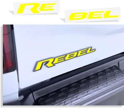 Ram 1500 Rebel 2019-2026 - calcomanía con incrustación de emblema de puerta trasera Foto 1 de 4