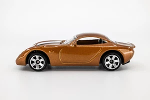 2009 Matchbox #14 TVR Tuscan BROWN METALLIC | MINT - Picture 1 of 1