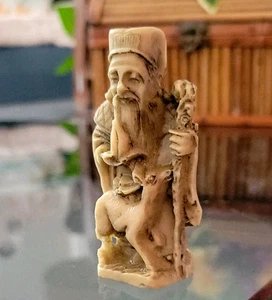 Netsuke Vintage Japanese Resin Figurine Sculpture Man Pipe Lamb Walking Stick - Picture 1 of 7