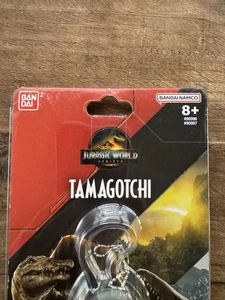 Tamagotchi Jurassic World: Rebirth Spinosaurus Bandai Japan Nano Spielzeug Spiel - Bild 1 von 8