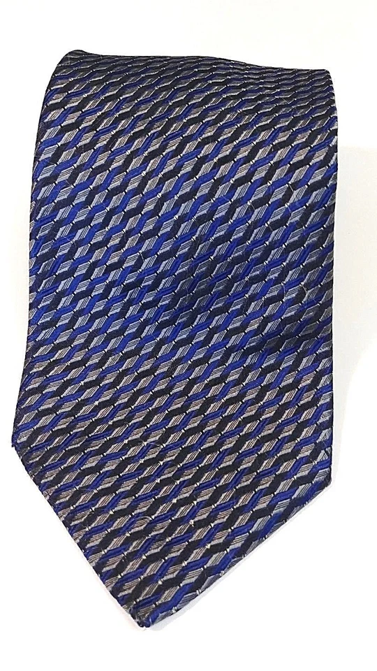 Corbata de seda italiana para hombre TOM JAMES, INOCENTI tejida geométrica negra azul, dorada Foto 1 de 4