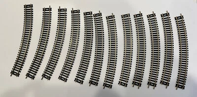 Atlas Model Train - 9” Curved Silver-colored Train Tracks - LOT of 12 - Image 1 of 4