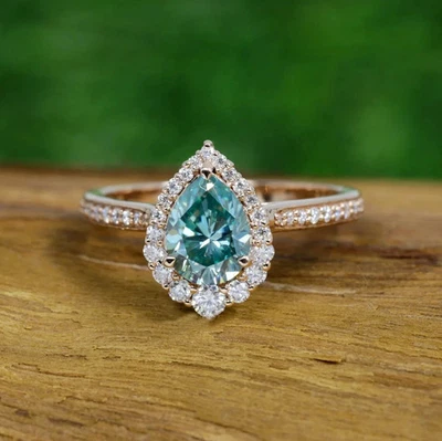 Anillo de mujer con halo de diamantes y aguamarina talla pera de 2 quilates enchapado en oro rosa de 14 quilates Foto 1 de 4