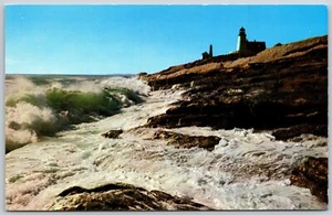 Maine Along Coast Surf Breaks Over Granite Cliffs Under Old Lighthouse Postcard - Picture 1 of 2