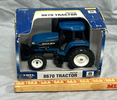 FORD New Holland 8670 FWA Tractor w Cab 1:32 Ertl Diecast NIB - Image 1 of 4