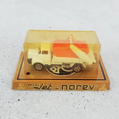 Camión de plástico fundido a presión Mini Jet De Norev de colección naranja/blanco 447 RVI MULTIBENNES Foto 1 de 4