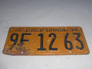 VINTAGE 1934 CALIFORNIA LICENSE PLATE ORIGINAL 9F 12 63 YELLOW BLACK - Picture 1 of 4