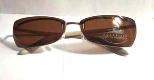 Gafas de sol Silhouette sin montura modelo 8086 color dorado - marrón cerámica polarizada - Imagen 1 de 4