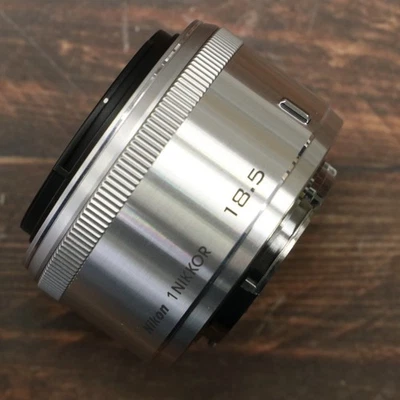 Nikon 1 NIKKOR 18,5 mm f/1,8 plata [casi como nueva] #6661 - Imagen 1 de 4