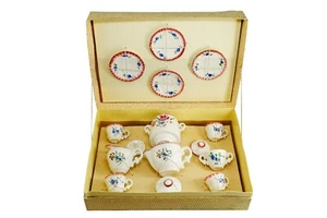 Dinette vintage en porcelaine - Photo 1/9