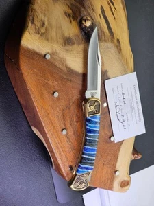 BUCK 110 FOLDING LOCKBACK HUNTER KNIFE BY MIKE NEWLAND WITH CUSTOM BOLSTERS COA - Picture 1 of 10