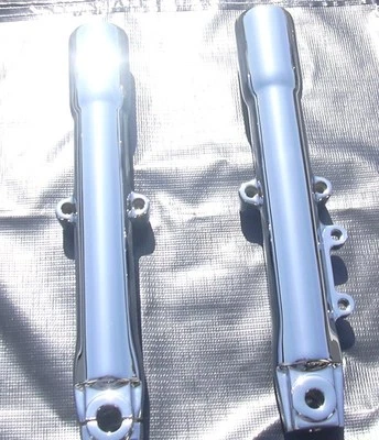 Harley Davidson Deluxe FLSTN 2000-2006 Chrome Lower Slider Fork Legs Exchange - Image 1 of 4