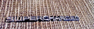 1995-2004 Buick  Park Ave Regal Riviera "Supercharged" Emblem Badge 25602037 - Image 1 of 4
