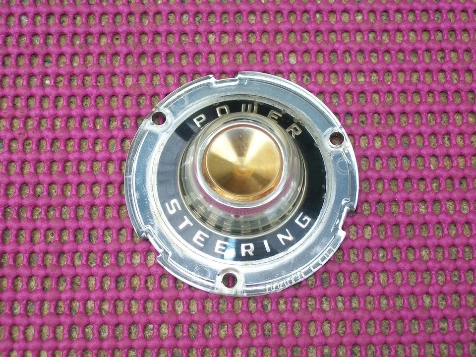 1955 Chrysler Windsor 56 Crown Imperial NOS MoPar "POWER STEERING" HORN ORNAMENT - Image 1 of 1
