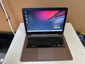Asus RX310U | i3-6100U | 12GB RAM | 256GB SSD | Win11 | QWERTY | Charger - Afbeelding 1 van 5
