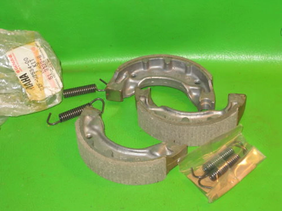 YAMAHA TY350 REAR BRAKE SHOE SET W/SPRINGS OEM # 22F-W2534-00 - Image 1 of 1