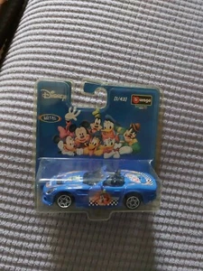 Auto Burago 1/43 Nuova Blisterata Shelby Series 1 Walt Disney Di Pippo - Foto 1 di 8