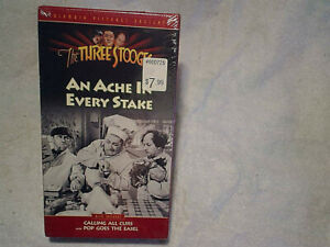 THE THREE STOOGES AN ACHE IN EVERY STAKE VHS SEALED,Watermark,pop goes the easel
