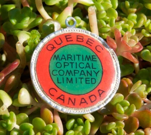 SMALL VINTAGE HAND MADE ENAMEL KEYCHAIN # MARITIME OPTICAL COMPANY QUEBEC CANADA - Picture 1 of 2