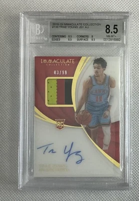 2018 Immaculate Collection #136 Trae Young JSY AU RC  BGS 8.5 NM-MT+ - Image 1 of 2