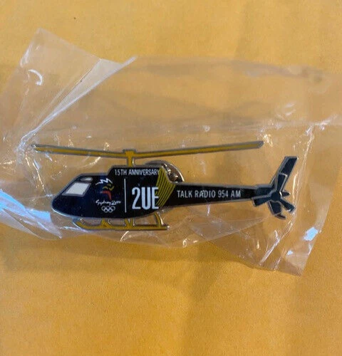 SYDNEY OLYMPICS PIN 2UE TALK RADIO MEDIA HELICOPTER 15TH ANNIVERSARY PIN NEW - Image 1 of 1