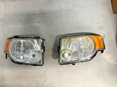 Пара фар в сборе для внедорожника Ford Escape 2008 2009 2010 2011 2012 годов выпуска - Изображение 1 из 2