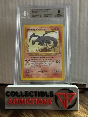 2002 Pokemon Neo Destiny Unlimited #107 Shining Charizard BGS 8 - Image 1 of 2