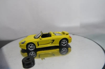 MALIBU HO МАСШТАБ 1/87 PPORSCHE CARRERA GT В ЖЕЛТОМ ОТЛИЧНОМ СОСТОЯНИИ ПОЧТИ КАК НОВЫЙ СВОБОДНЫЙ! - Изображение 1 из 4