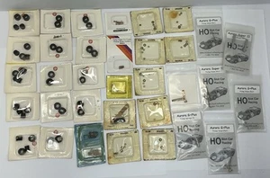 LARGE LOT - AFX - AURORA ETC - PARTS - PICKUP SHOES - SPACERS ALL N.I.B. (T234) - Picture 1 of 8