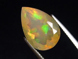 Feueropal mit Farbenspiel 6,77 Ct. Tropfen Mexiko (5586t) - Bild 1 von 2