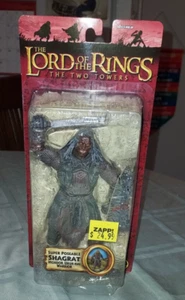 2004 TOY BIZ EL SEÑOR DE LOS ANILLOS LAS DOS TORRES SHAGRAT MORDOR URUK FIGURA MIP - Imagen 1 de 3