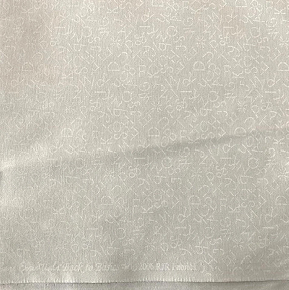 1 Yd. White on Ivory Fabric featuring the Alphabet, Bare Essentials, 2006 RJR - Image 1 of 1