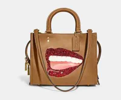 Cartera de cuero Coach Tom Wesselmann Lips Smile Rogue 25 Foto 1 de 4