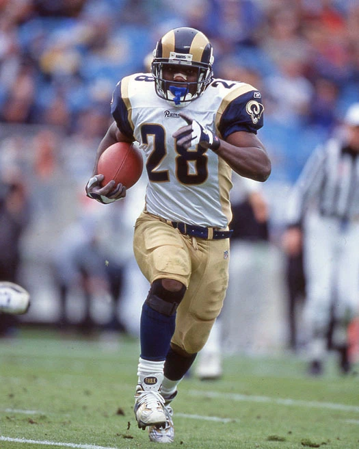 Póster impreso de fútbol americano de la NFL con foto brillante de Marshall Faulk 2001 de los St Louis Rams Foto 1 de 1