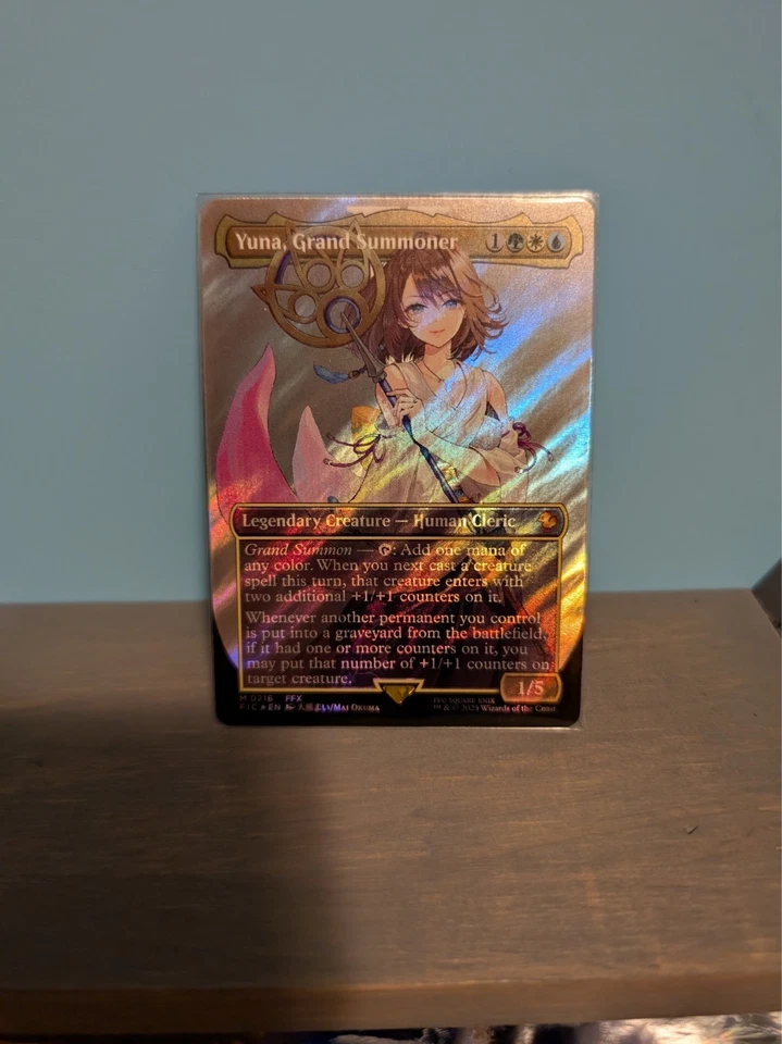 Yuna, Grand Summoner (Borderless) (Surge Foil) Commander: Final Fantasy Foil - Image 1 of 2