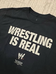 Camiseta Travis Scott x WWE “Wrestling Is Real” Gráfica Negra Talla XL - Imagen 1 de 4