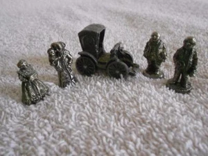 1994 AMERICANA LIBERTY FALLS MINIATURA PELTRO FIGURINE PERSONE CARROZZA - Foto 1 di 2