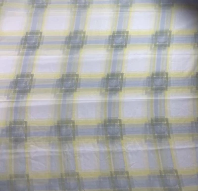 Tela transparente de gasa a cuadros amarilla y gris - por yarda Foto 1 de 2