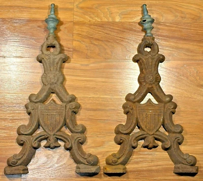 PAIR ANTIQUE CAST IRON FIREPLACE ANDIRONS SHIELD CREST DESIGN W/ FINIAL TOPS 17" - Image 1 of 4