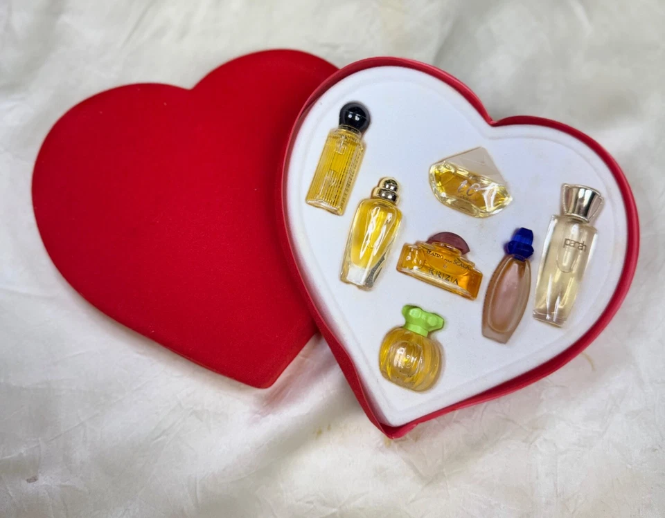 7 MINI EAU DE PARFUM SPLASH VON VERSCHIEDENEN MARKEN & GRÖßEN (NEU MIT KARTON) - Bild 1 von 4