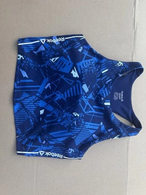 Sujetador deportivo acolchado Reebok para mujer talla S estampado azul recortado espalda deportiva Foto 1 de 3