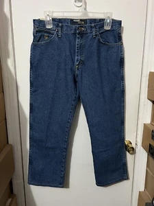 NUEVO CON ETIQUETAS Para hombres Wrangler George Estrecho Corte Vaquero Calce Original Pantalones de mezclilla azules con dobladillo 34x27 - Imagen 1 de 7
