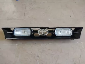 Toyota Corolla (1992 - 1996) AE100, AE101 HELLA Grill Clear/Yellow Fogs New - Picture 1 of 6