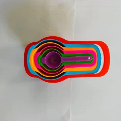 Plastic Measuring Spoons Set Six Pieces Multi Colors Nesting Ring - Image 1 of 4