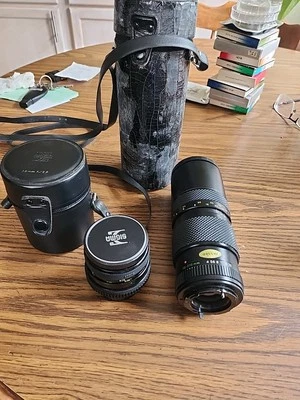 Lot Of 2 Camera Lenses, A 70-210mm And 28mm Mini Wide - Image 1 of 4