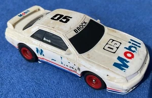Aurora AFX NISSAN AFX BROCK 05 Slot car race car. 1:64th scale slot car - Picture 1 of 3
